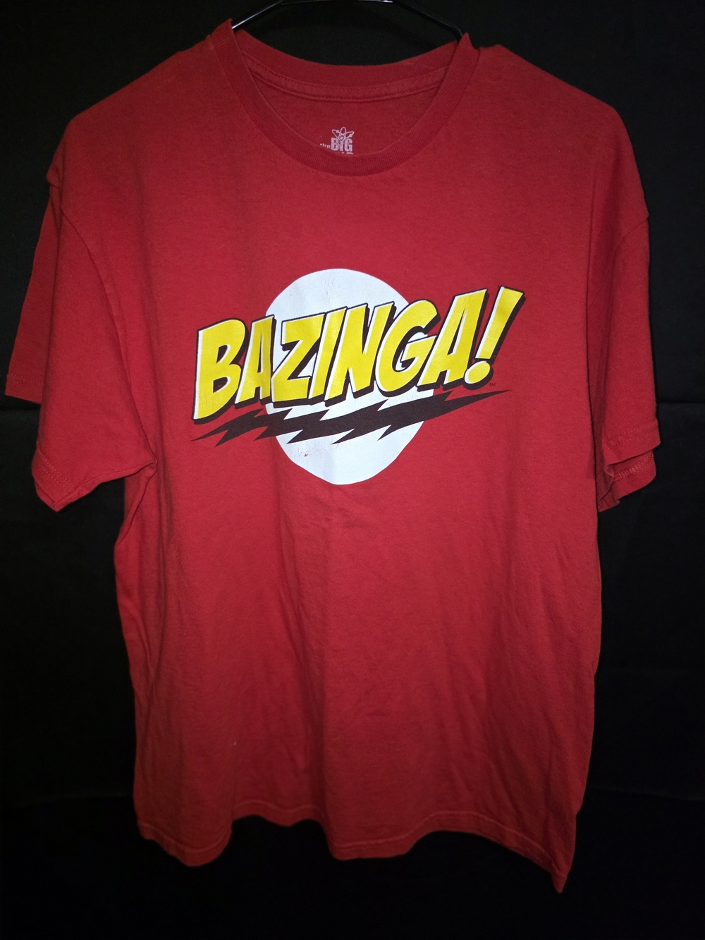Big Bang Theory Ripple Junction Red 'Bazinga!' Graphic Tee with Yellow Print